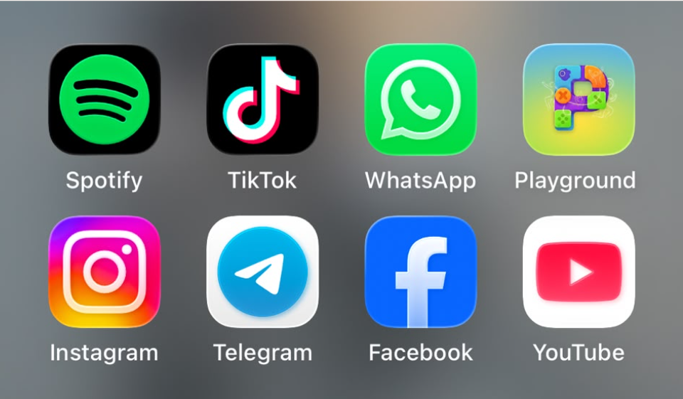 App icons for Spotify, TikTok, WhatsApp, Playground, Instagram, Telegram, Facebook, and YouTube